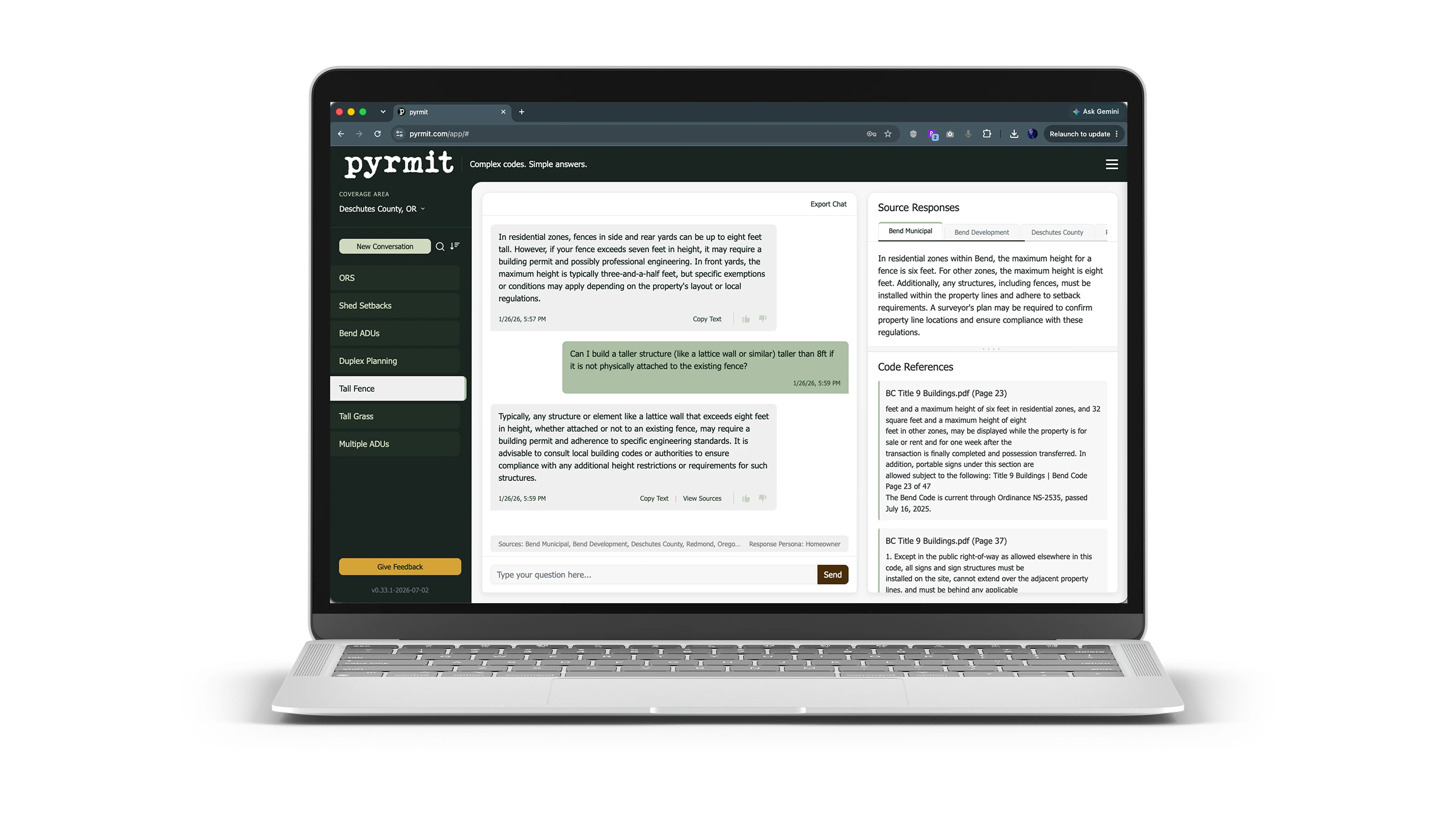 pyrmit building-code research interface on a laptop, with a conversation, source responses and code references.